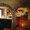 kitchen remodel featuring plaster stone, stainless steel backsplash, new distressed ceiling beams